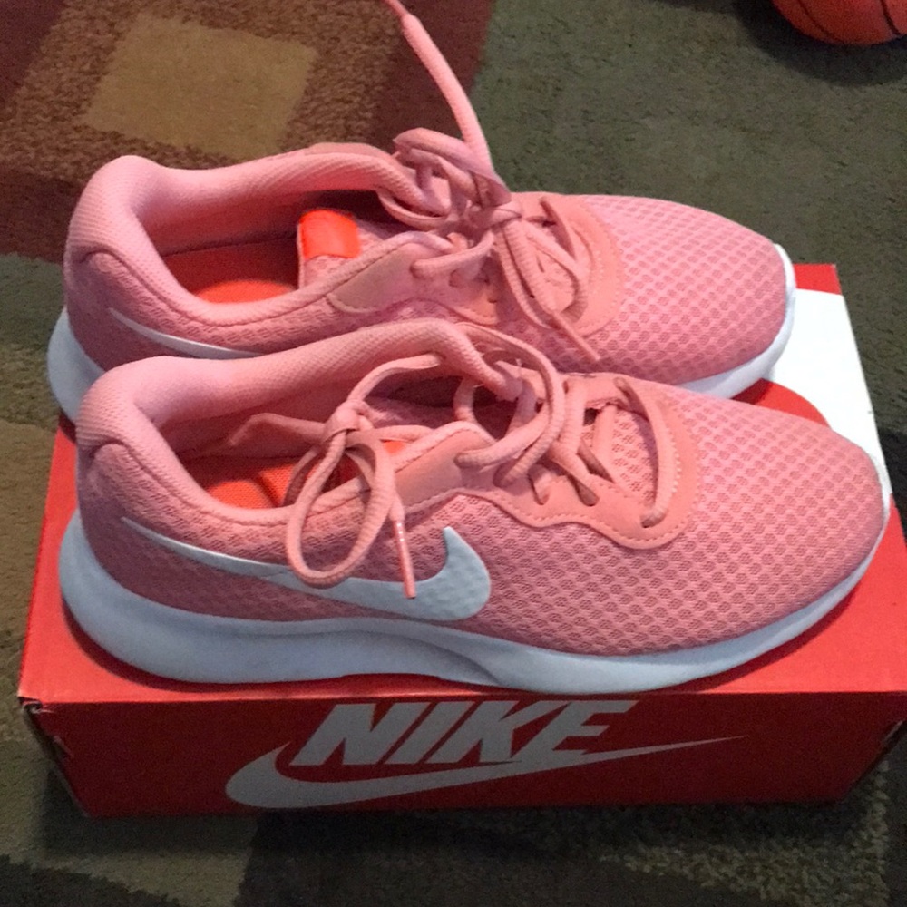 Womens pink and white Nike Tanjun size 7.5